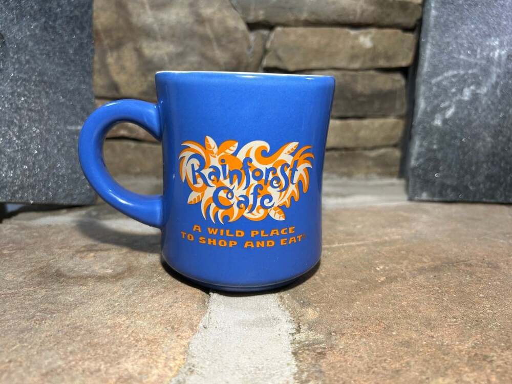 1999 RAINFOREST CAFE A WILD PLACE TO SHOP AND EAT Blue Coffee Cup Mug